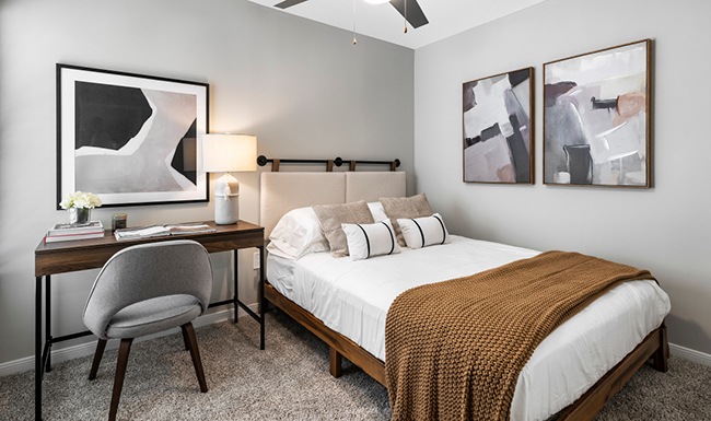 Bedroom with natural lighting and high ceilings