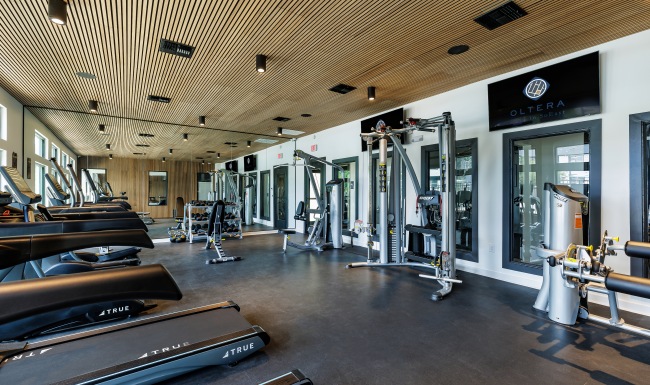 Large fitness center at Oltera Apartments 